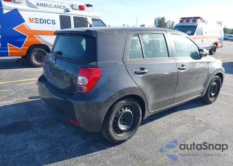 2012 Scion Xd Base (A4) z USA, uszkodzony, nr VIN JTKKU4B47C1017387